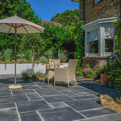 Summer Patio with grey stone and plants